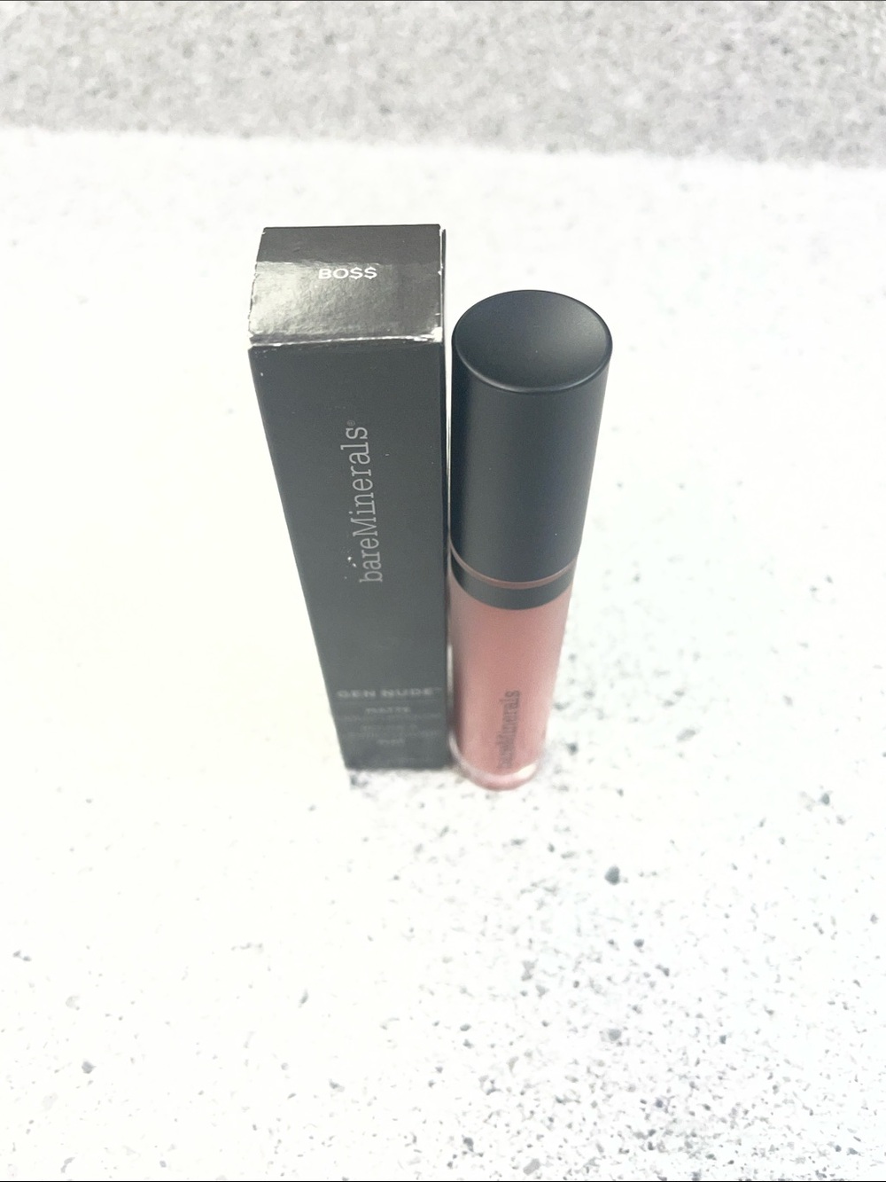 bareMinerals Liquid Lipstick in Warm Nude Pink Beige color on box Boss